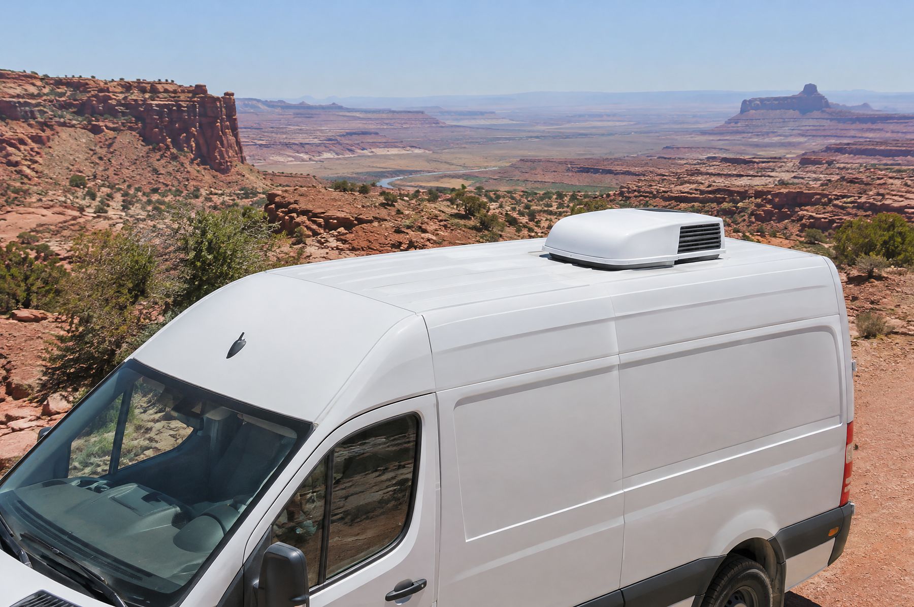 Low-profile air conditioner on a van in the desert
