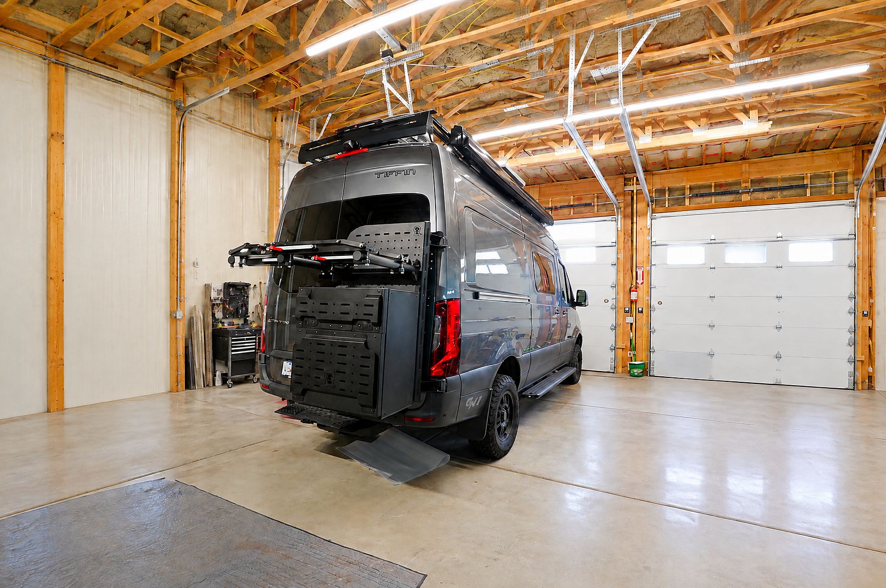 Owl rear-door carrier with bike rack on a Sprinter in the shop