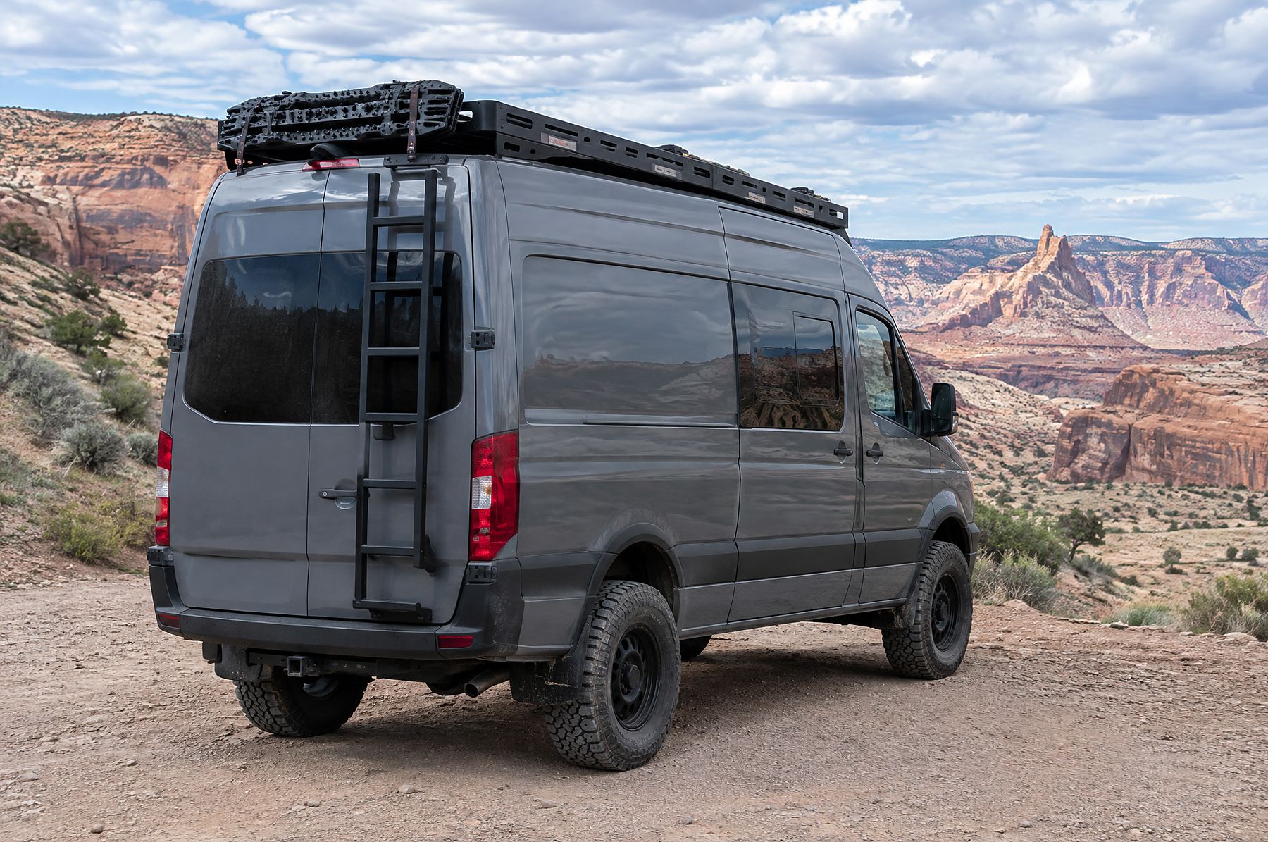 Roof rack with decking and a rear ladder