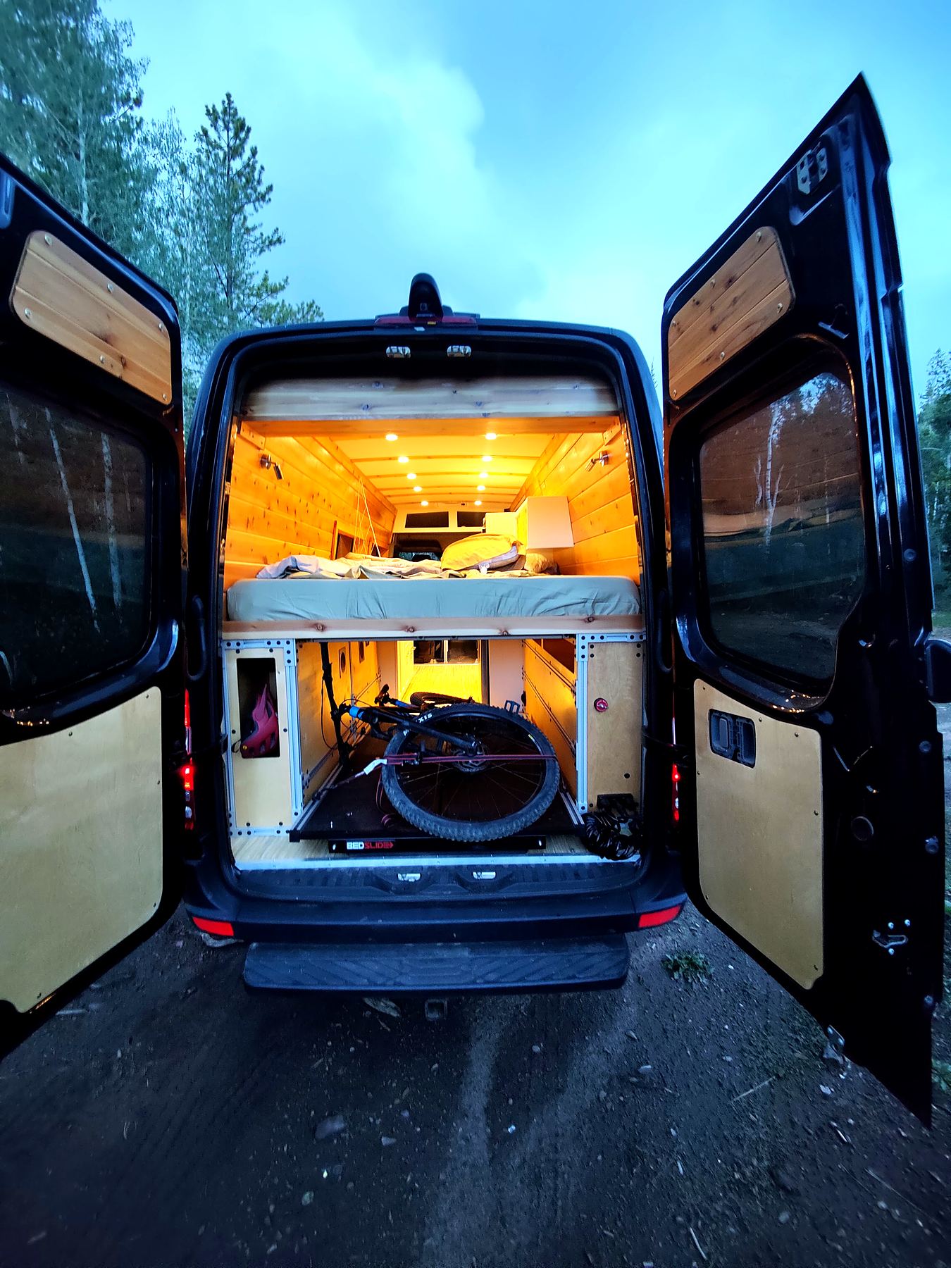 Van running on its battery system at dusk