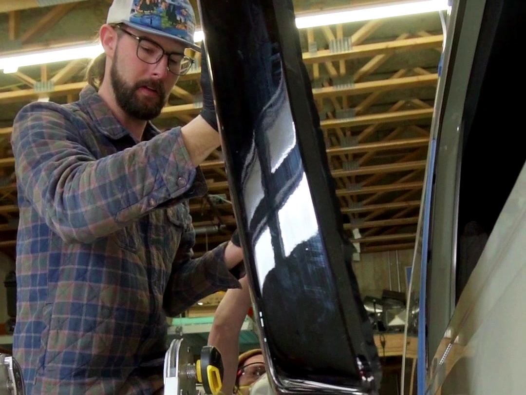 Lifting the flare into place on the van