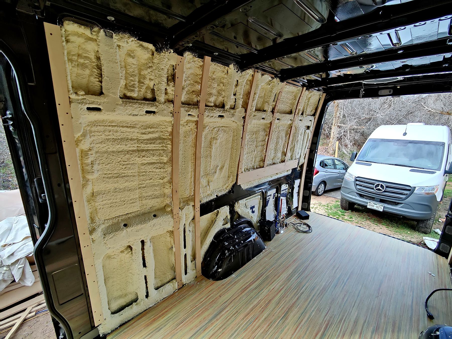 Van walls framed and insulated mid-build
