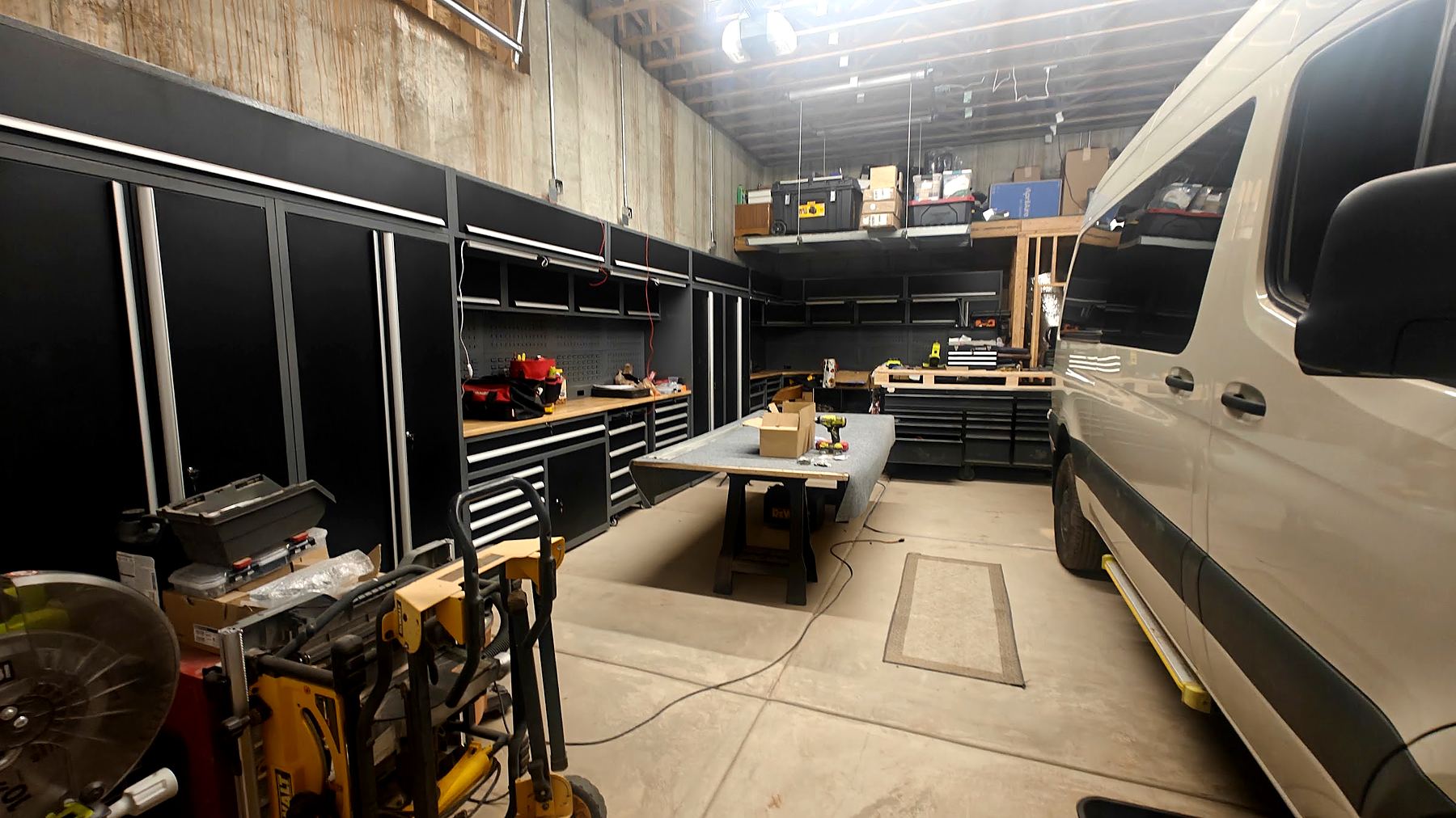 A Sprinter in the bay at the Alt Life Vans shop