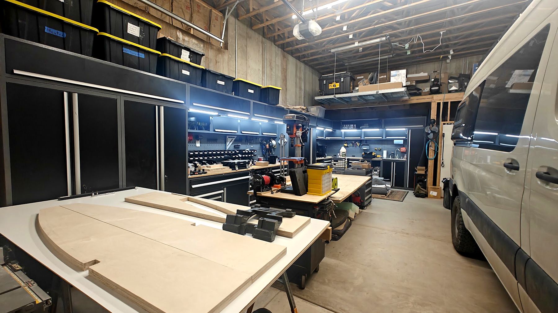 Inside the Alt Life Vans shop in Emigration Canyon with workbenches and tool storage